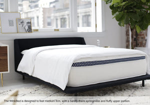 The WinkBed is designed to feel medium firm, with a barely-there springiness and fluffy upper portion.