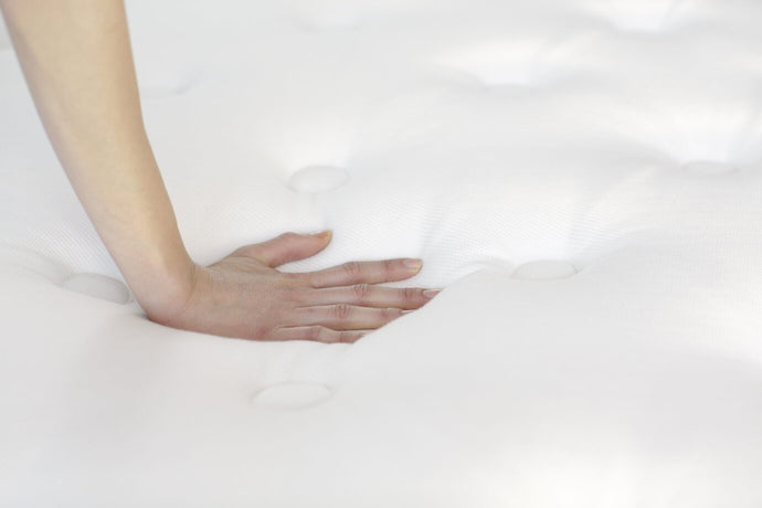 A quilted tencil cover, Individually wrapped coils and foamy, medium-firm top give the WinkBed a pleasingly hefty hybrid feel.